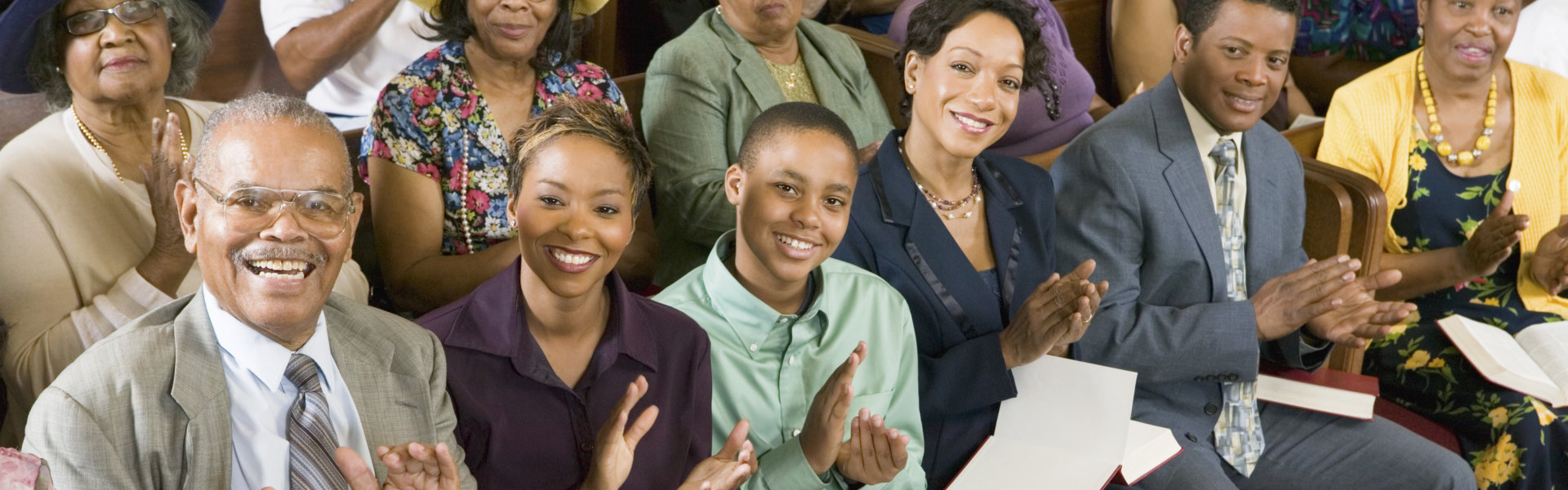 group of people smiling togehther